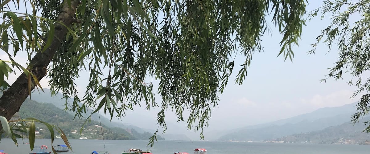 Parked Coloured boats in Phewa Lake. Do not forget to take a Boat trip if you are in Pokhara. Its a long and relaxing trip and and not so expensive.