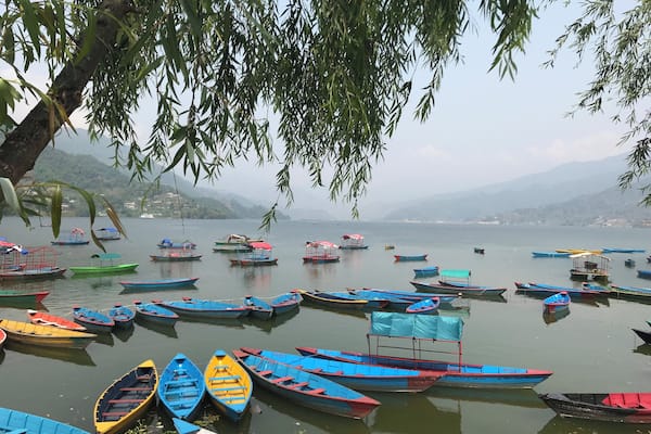 Parked Coloured boats in Phewa Lake. Do not forget to take a Boat trip if you are in Pokhara. Its a long and relaxing trip and and not so expensive.
