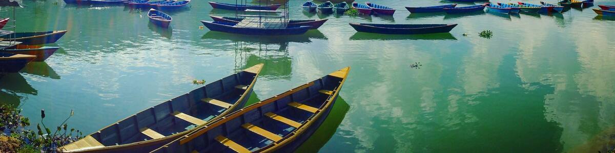 Taking time to relax lakeside in Pokhara, Nepal is necessary to escape the hustle and bustle of Katmandu, or put your feet up after hiking in the Himalayas! #lifeatexpedia #green