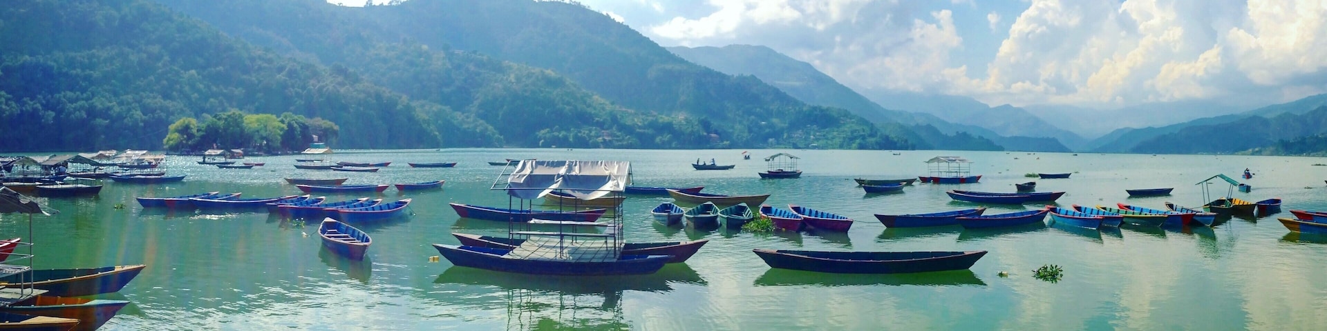 Taking time to relax lakeside in Pokhara, Nepal is necessary to escape the hustle and bustle of Katmandu, or put your feet up after hiking in the Himalayas! #lifeatexpedia #green