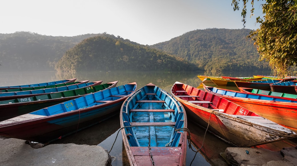 Colorful boats in Phewa lake in Pokhara, Nepal