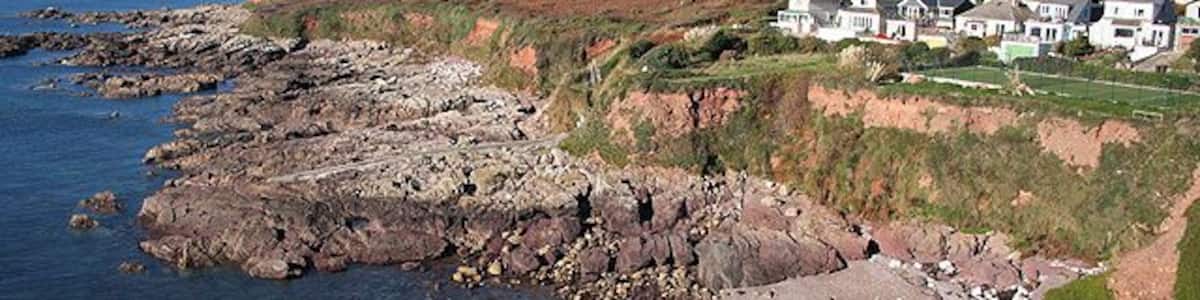Wembury: coast at Heybrook Bay Looking towards Cawsand Bay with the neighbouring Cornish villages of Cawsand and Kingsand across the water, in the distance