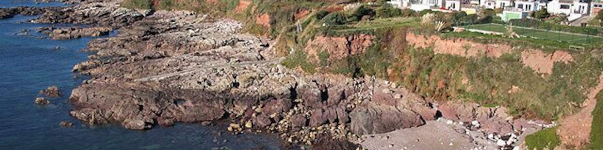 Wembury: coast at Heybrook Bay Looking towards Cawsand Bay with the neighbouring Cornish villages of Cawsand and Kingsand across the water, in the distance
