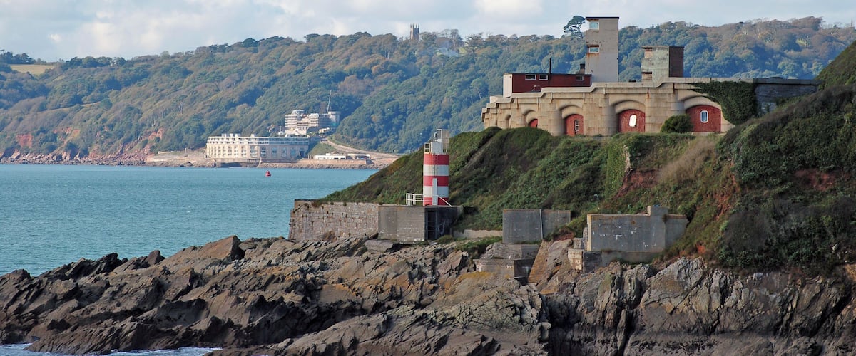 Two of the major forts built in the 1860s to protect Plymouth Sound from enemy ships: Fort Bovisand, on the Devon side of the Sound, is in the foreground. Fort Picklecombe, on the Cornish side is visible in the distance.