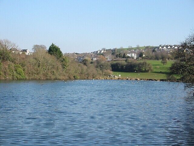 Radford Lake in Plymstock. This used to be an area of tidal mudflats but was dammed to form a freshwater lake. It is surrounded by suburban housing.