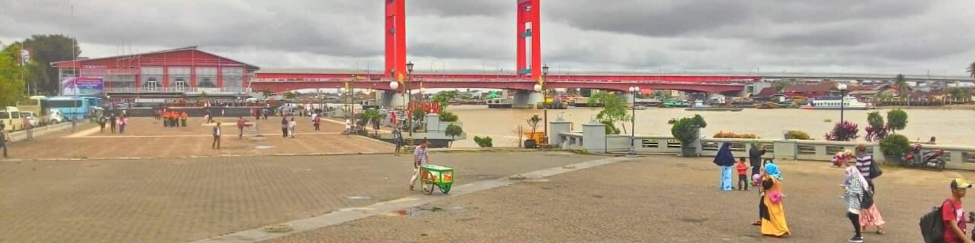 Ampera Bridge with an area of 400.6 Km2, 1,177 meters long and 22 meters wide