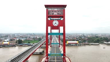 an iconic red bridge from the city of Palembang