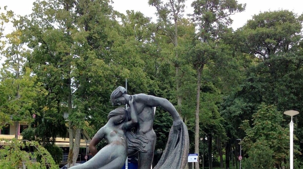 Palanga, the main resort in Lithuania, has a monument dedicated to Jūratė and Kastytis. It is located in a square right next to the main tourist attraction—a bridge that leads to sunset. The Palanga coat of arms was designed having the legend in mind. The amber beads represent the ancient business of amber processing. The silver crown represents goddess Jūratė