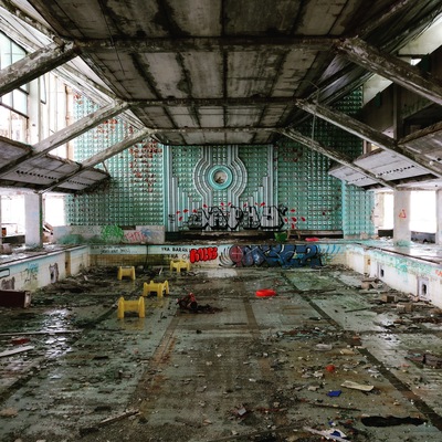 Abandoned pool in Palanga, Lithuania. This is a great place to visit if you are a fan of abandoned places and urban exploration. This place is a former Soviet Union pool. 
Check it out!