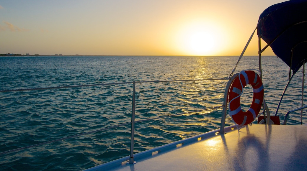 Providenciales showing boating and a sunset