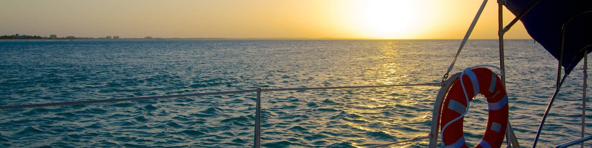 Providenciales which includes a sunset and boating