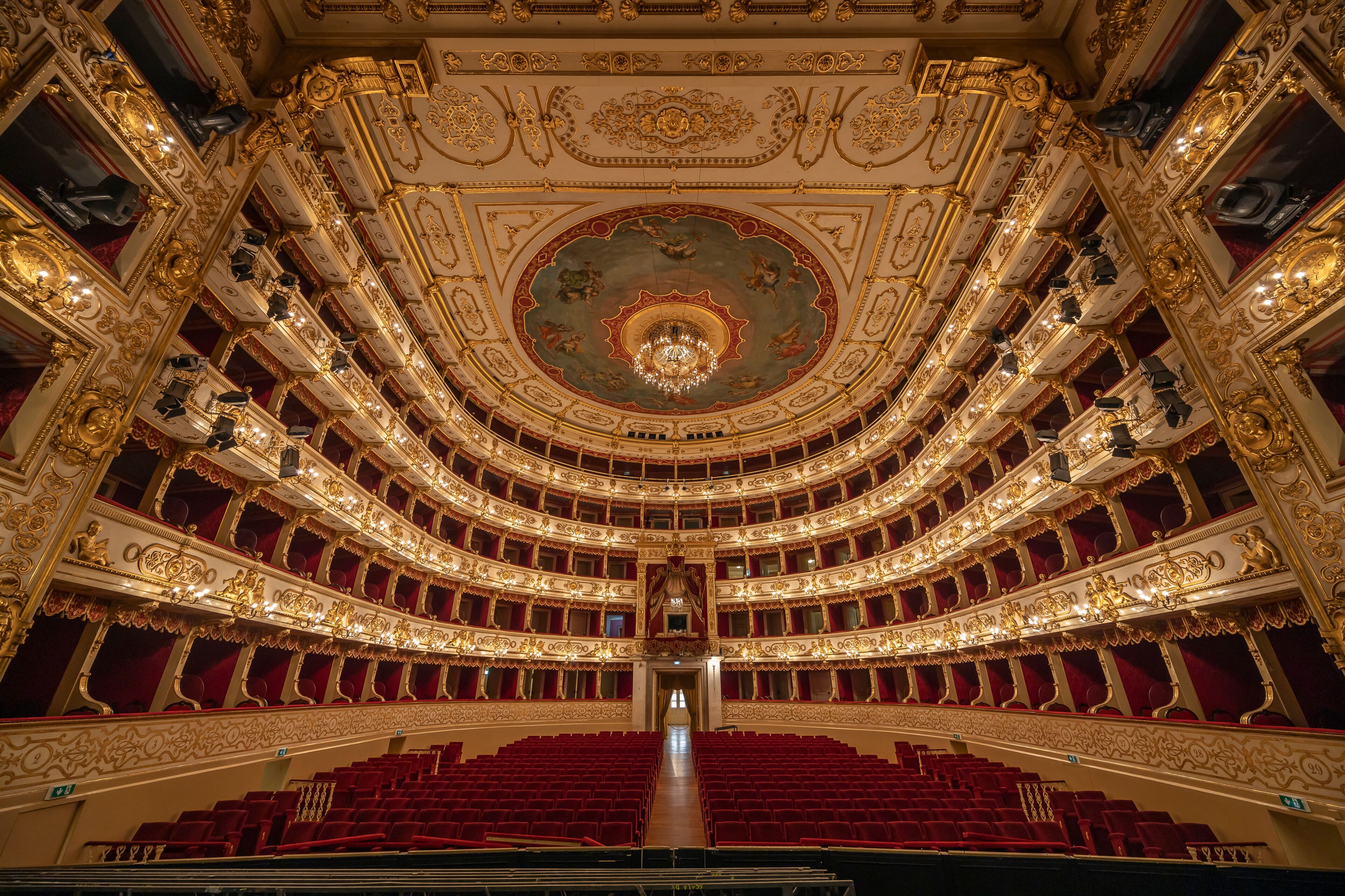 Parma, Italy - April 10, 2023: panoramic view of the historic Teatro Regio, formerly known as New Ducal Theatre, in Emilia-Romagna, Italy. 
StructuStructure is built in wood and was completed in 1618.