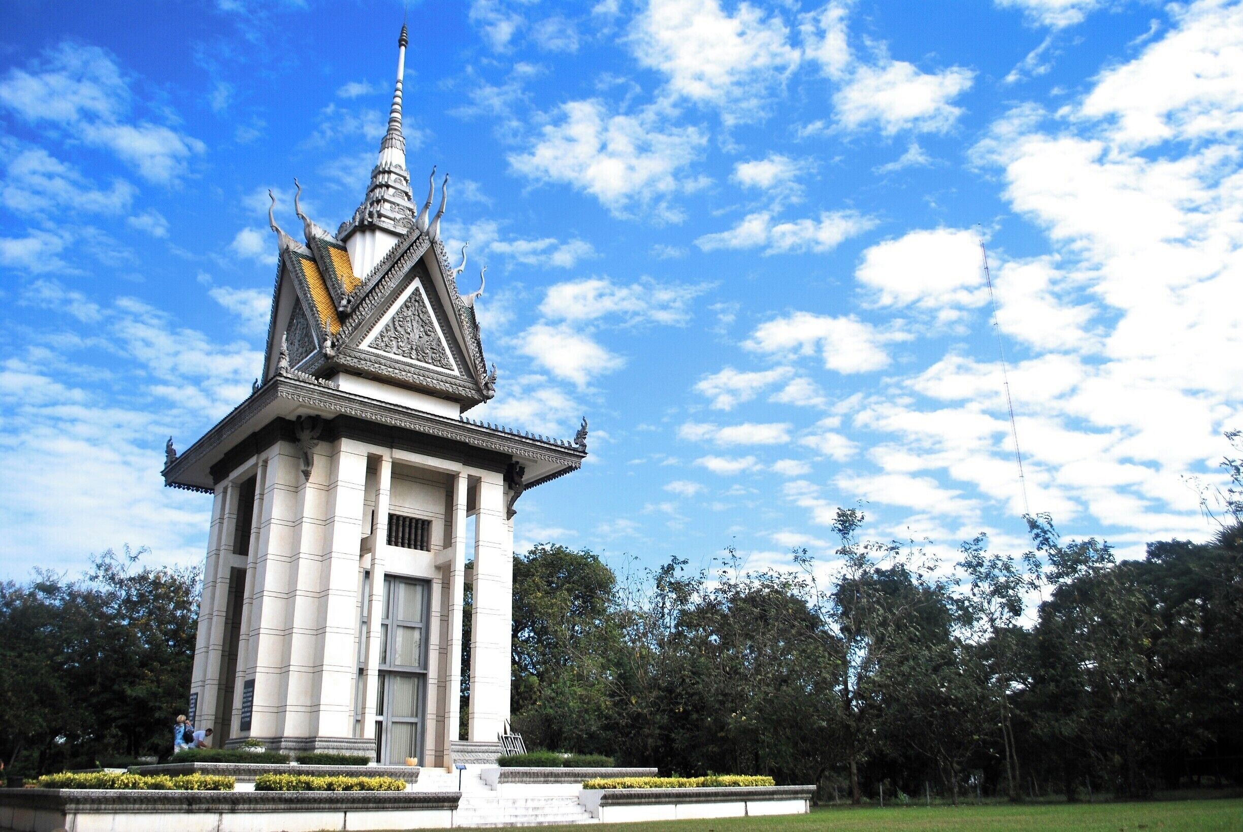 A monument built to commemorate the victims of the Pol Pot regime. 
The building was designed to house the remains of the victims killed in the Choeung Ek, a killing field in Phnom Penh during the Pol Pot Regime. Visiting the Choeung Ek killing fields was a sad, but necessary experience. Visitors will get an audio tour of the killing fields, which includes the history of the place, the Pol Pot regime, as well as stories of the survivors of the Khmer Rouge. The graves were left untouched, so fragments of bones and clothes of the victims are still visible around the area.
To get here, we arranged a tuktuk service with our hostel. It is about 25 to 30 minutes from the city centre. We also visited Tuol Sleng Genocide Museum after (the museum is in the city centre). It's a school (turned prison) in the city where they used to process prisoners before bringing them to the killing field.
#phnompenh #cambodia #southeastasia #asia #travel #wanderlust #history #khmerrouge #architecture
