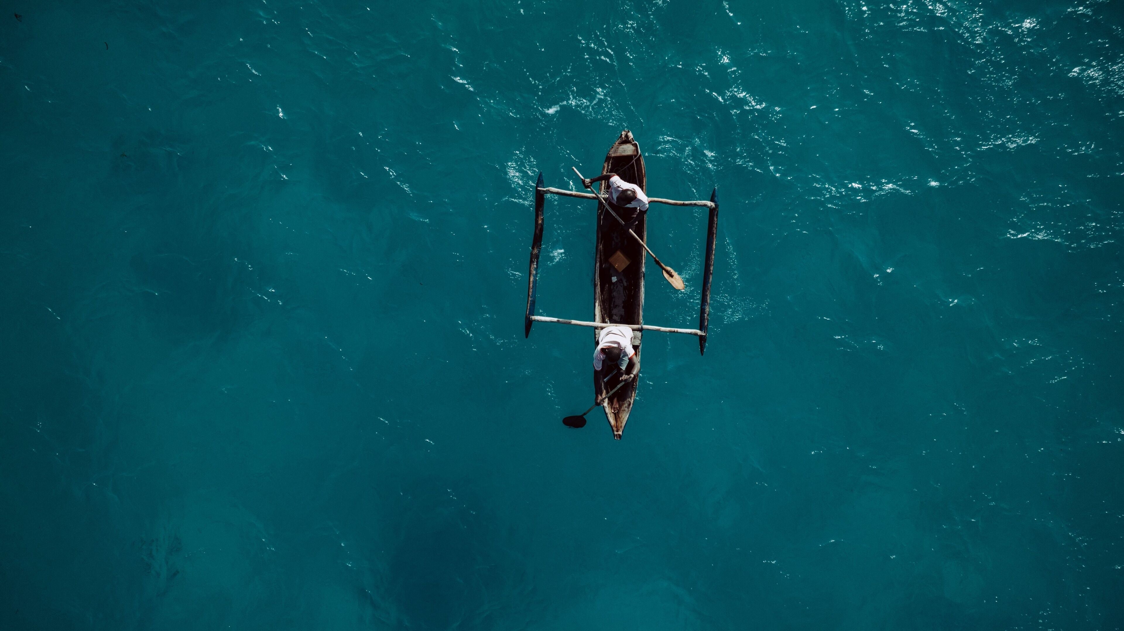 Traditional canoe paddling in Mozambique