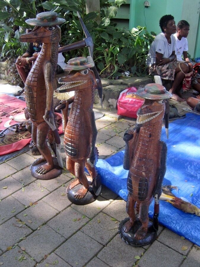 The Ella Beach Market is once a month on a Saturday. Beautiful handicrafts from wood paintings, baskets, pearls, native flowers (bird of paradise), bilums etc. 
You can spend the whole morning there.

It cost one kina to get in!

Cash only!