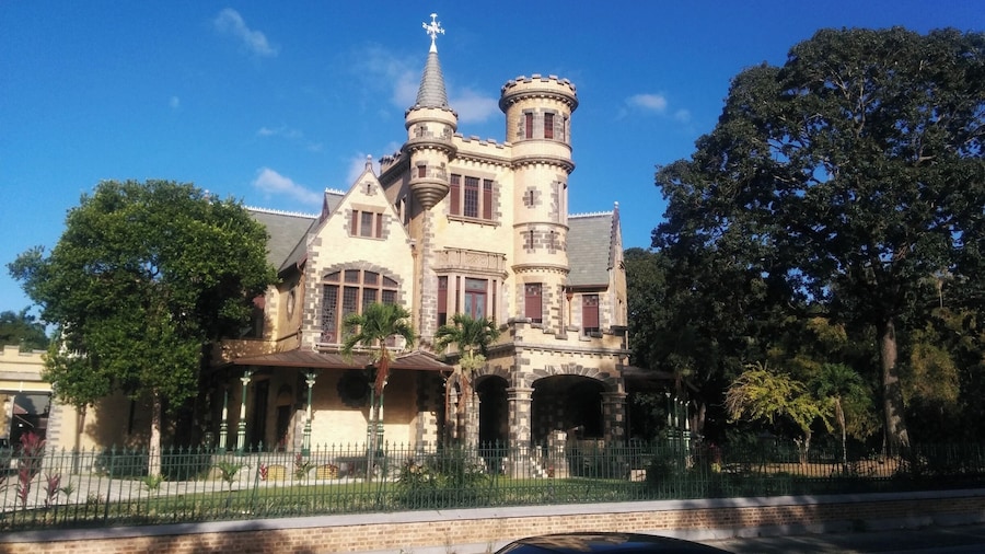 One of the Magnificent Seven historical buildings around the Queen's Park Savannah in Port-of-Spain in Trinidad. Now fully refurbished it was earmarked to be a hotel for visiting Diplomats etc to the Govt of Trinidad and Tobago.