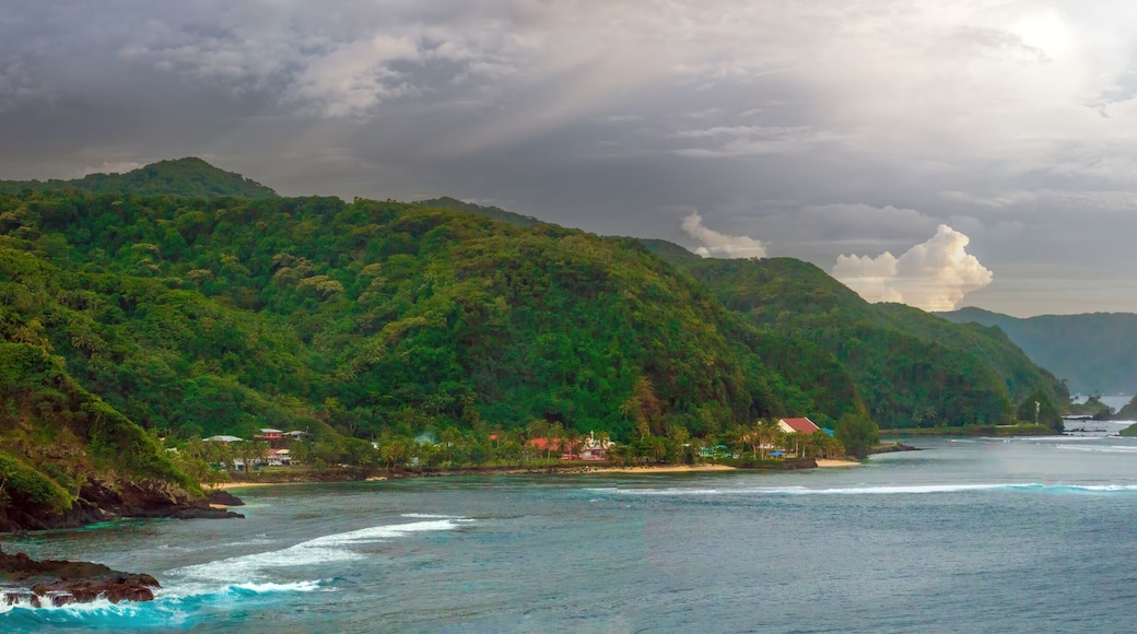 Scenic view of the coastline of Tutuila island, north of Pago Pago harbor, American Samoa, South Pacific, The famous camel rock can be seen in the distance