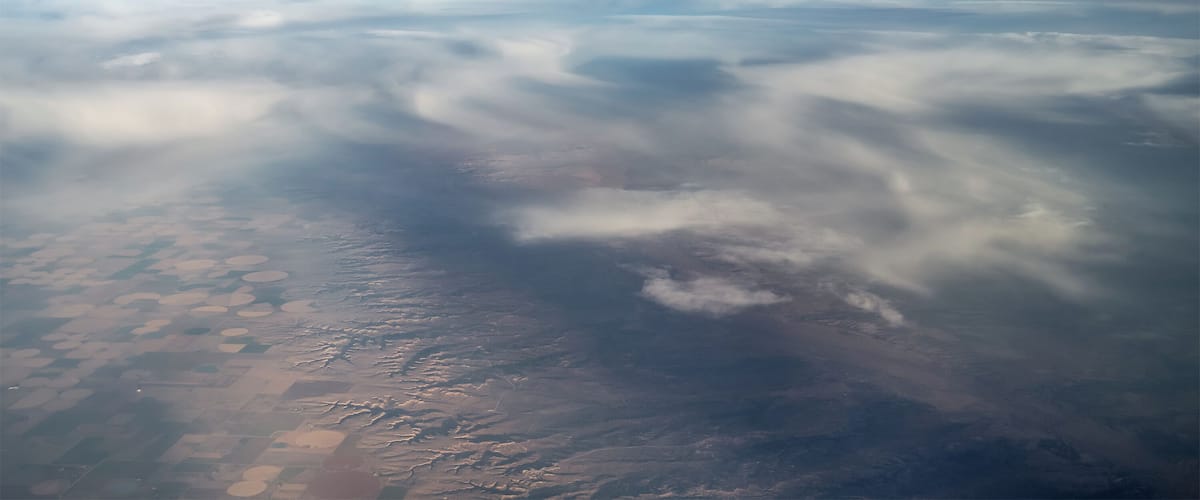 #windowseat   Not really sure exactly WHERE this is, but it was on the way into Houston, so I'm guessing we were around Waco, Texas.  Window seat strategies take into consideration time of day.  Having a seat on the left-hand side of the plane allowed me some views that were illuminated by the late afternoon sun AND (if you can see it) a rising full moon.  Had I sat on the other side of the aisle, I no doubt would have seen a glorious sunset.  From up here, it's all amazing, and I was captivated by the light and shadow play going on between the clouds and the earth.
#lifeatexpediagroup