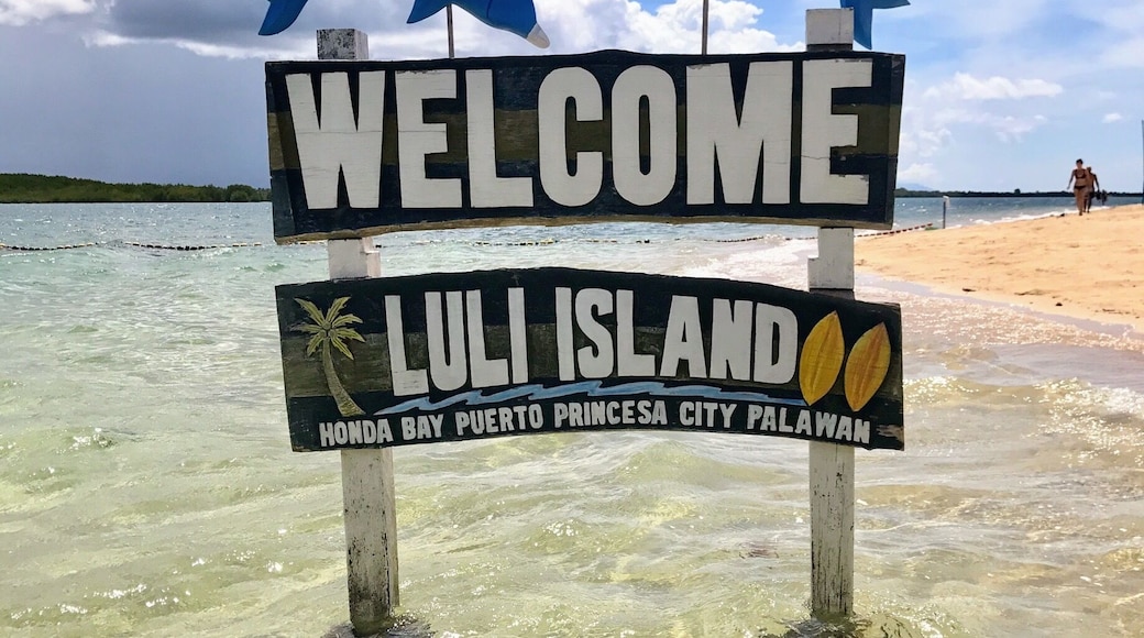 Beautiful warm swimming water at Luli also known as 'the sinking island' as during high tide you can't see it - only the buildings.
