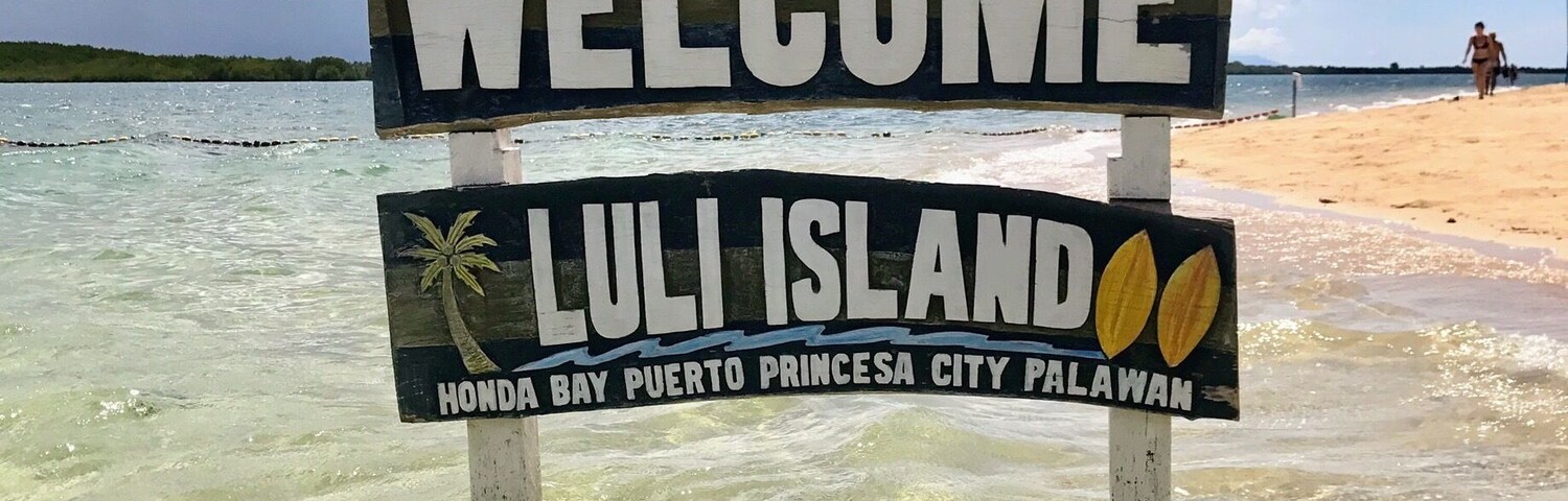 Beautiful warm swimming water at Luli also known as 'the sinking island' as during high tide you can't see it - only the buildings.