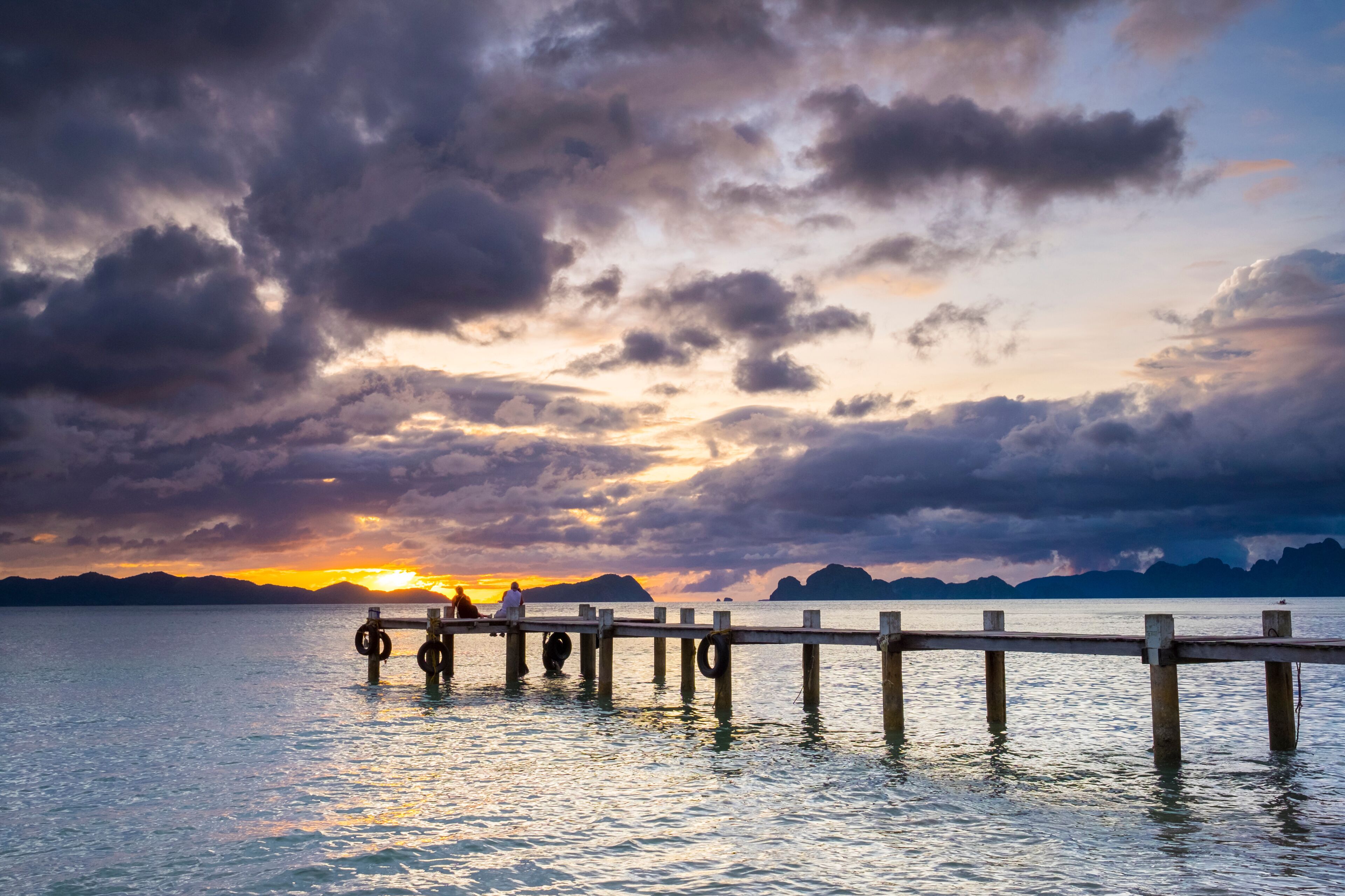Pier on Dolarog Beach at sunset, El Nido, Palawan, Philippines