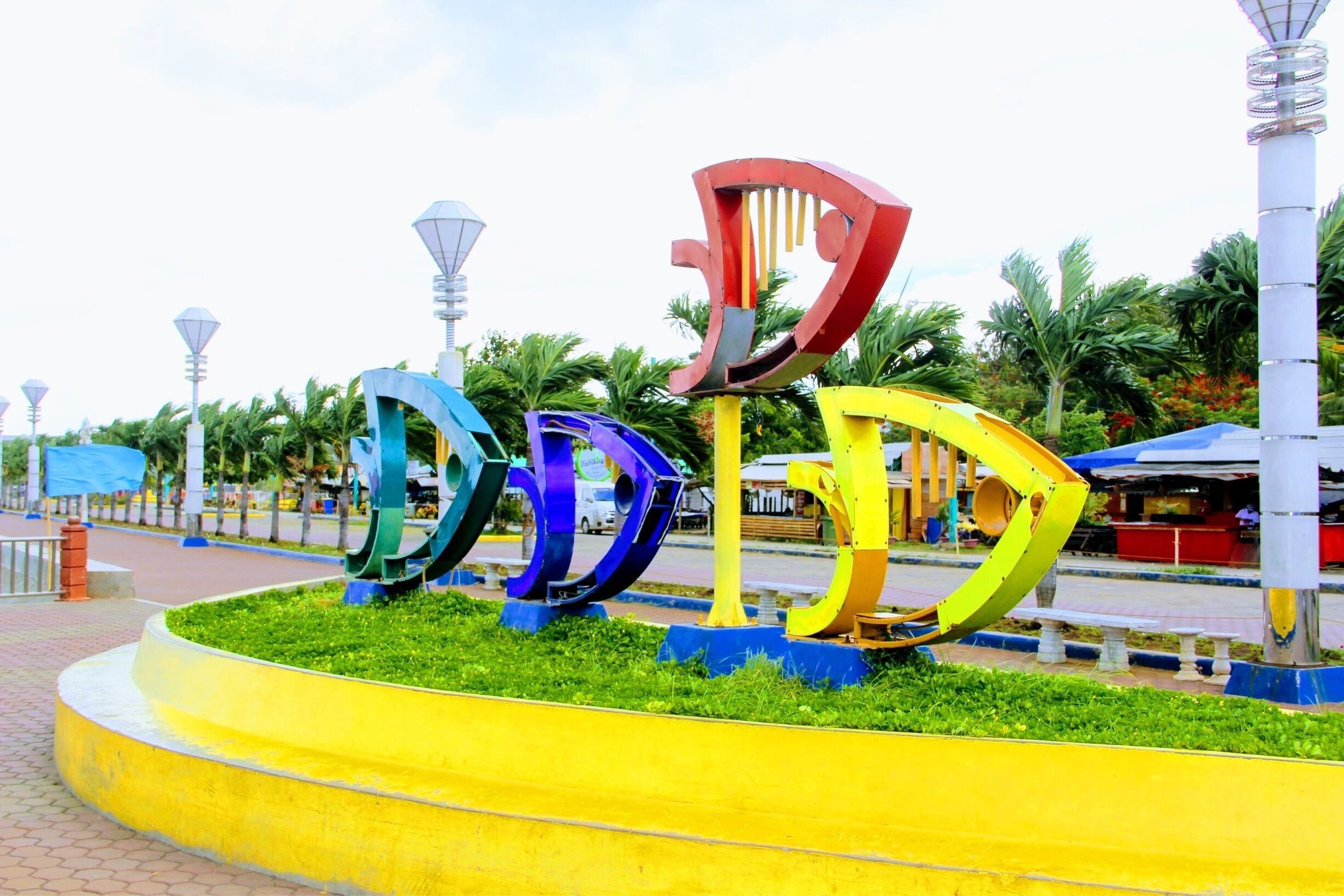 Brightly coloured fish as you stroll along the sea front. A large amount of eateries also there. 