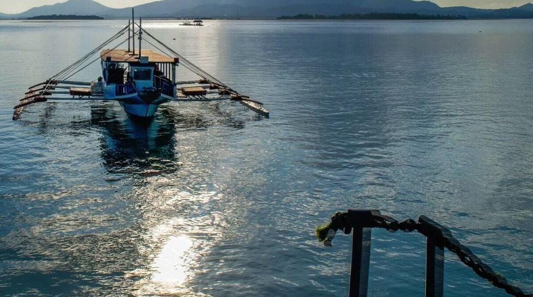 We were just about to leave Dos Palmas in Honda Bay on this morning when I noticed the beautiful way the sun reflected off of the water in front of the Banca. I had to drop my bags and get the camera out so I could capture this moment.