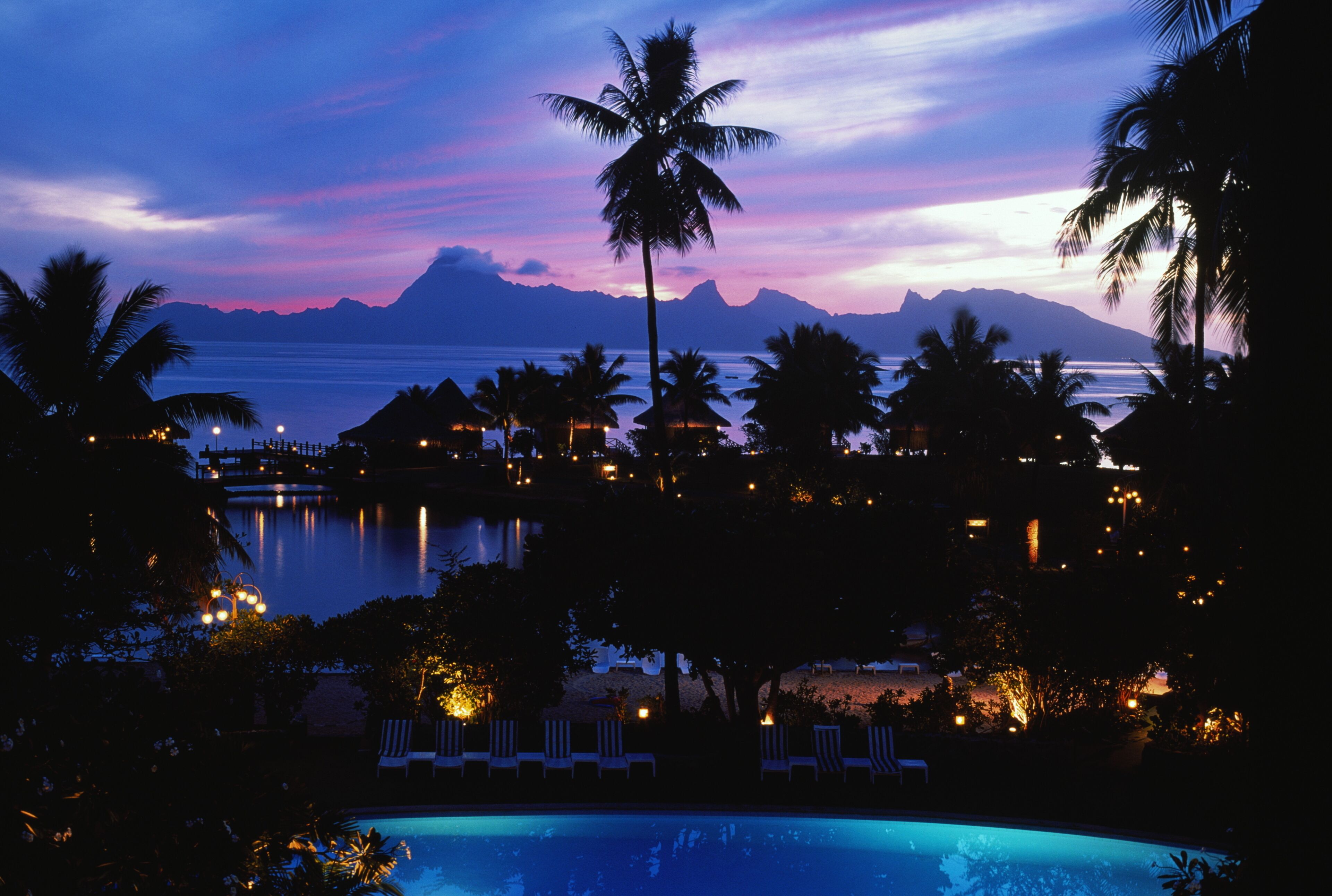 French Polynesia, Tahiti, Papeete at dusk, Moorea in distance