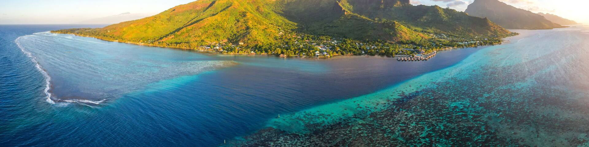 Aerial view of Maharepa with stunning coral reef and turquoise lagoon, Manava Beach Resort & Spa, Moorea, French Polynesia.
