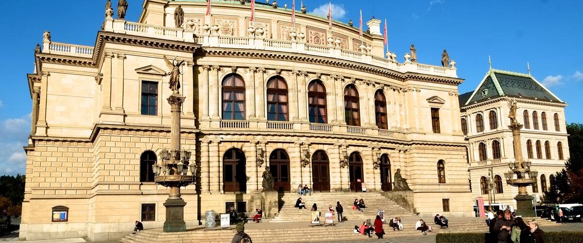 Rudolfinum is located on the right bank of the Vltava river at the Mánes Bridge on Aleš Embankment. This neo-Renaissance building was built by the Czech Savings Bank for the occasion of the 50th anniversary of its foundation. It was named after the Rudolfinum successor to the Habsburg throne, Archduke Rudolph. The architects hired for this project were the prominent personas of the art scene at the time - Josef Zítek and Josef Schulz.
The building was inaugurated in 1885 as a multipurpose cultural center with a concert hall and exhibition halls. Today, there is the Dvořák's Concert Hall, and also two smaller concert halls: Suk Hall and Kubelík Hall. The last complete renovation that the building has undergone was between 1990 and 1992.
Rudolfinum now houses the Czech Philharmonic orchestra and the Gallery Rudolfinum. Dvořák's Hall regularly hosts major concerts such as the world-famous Prague Spring