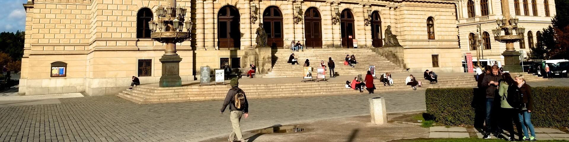 Rudolfinum is located on the right bank of the Vltava river at the Mánes Bridge on Aleš Embankment. This neo-Renaissance building was built by the Czech Savings Bank for the occasion of the 50th anniversary of its foundation. It was named after the Rudolfinum successor to the Habsburg throne, Archduke Rudolph. The architects hired for this project were the prominent personas of the art scene at the time - Josef Zítek and Josef Schulz.
The building was inaugurated in 1885 as a multipurpose cultural center with a concert hall and exhibition halls. Today, there is the Dvořák's Concert Hall, and also two smaller concert halls: Suk Hall and Kubelík Hall. The last complete renovation that the building has undergone was between 1990 and 1992.
Rudolfinum now houses the Czech Philharmonic orchestra and the Gallery Rudolfinum. Dvořák's Hall regularly hosts major concerts such as the world-famous Prague Spring