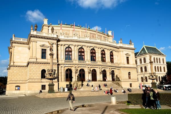 Rudolfinum is located on the right bank of the Vltava river at the Mánes Bridge on Aleš Embankment. This neo-Renaissance building was built by the Czech Savings Bank for the occasion of the 50th anniversary of its foundation. It was named after the Rudolfinum successor to the Habsburg throne, Archduke Rudolph. The architects hired for this project were the prominent personas of the art scene at the time - Josef Zítek and Josef Schulz.
The building was inaugurated in 1885 as a multipurpose cultural center with a concert hall and exhibition halls. Today, there is the Dvořák's Concert Hall, and also two smaller concert halls: Suk Hall and Kubelík Hall. The last complete renovation that the building has undergone was between 1990 and 1992.
Rudolfinum now houses the Czech Philharmonic orchestra and the Gallery Rudolfinum. Dvořák's Hall regularly hosts major concerts such as the world-famous Prague Spring