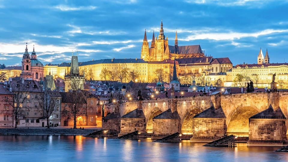 My twilight image of the Charles Bridge with St Vitus Cathedral in the background of Old Town Prague. Prague is magical at twilight.