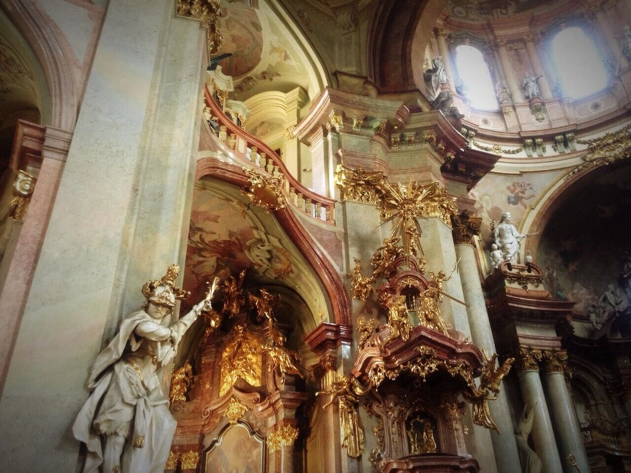 Be high in St. Nicholas' High Baroque grandeur.