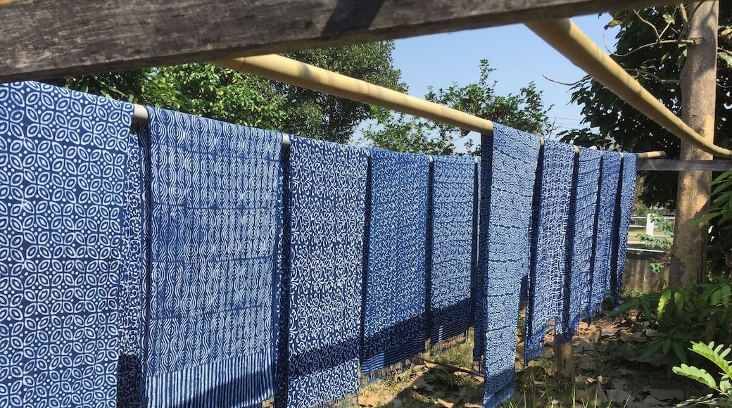We visited a shop that still uses the process to make indigo. Then, they use beautiful batik designs and dye the fabric.