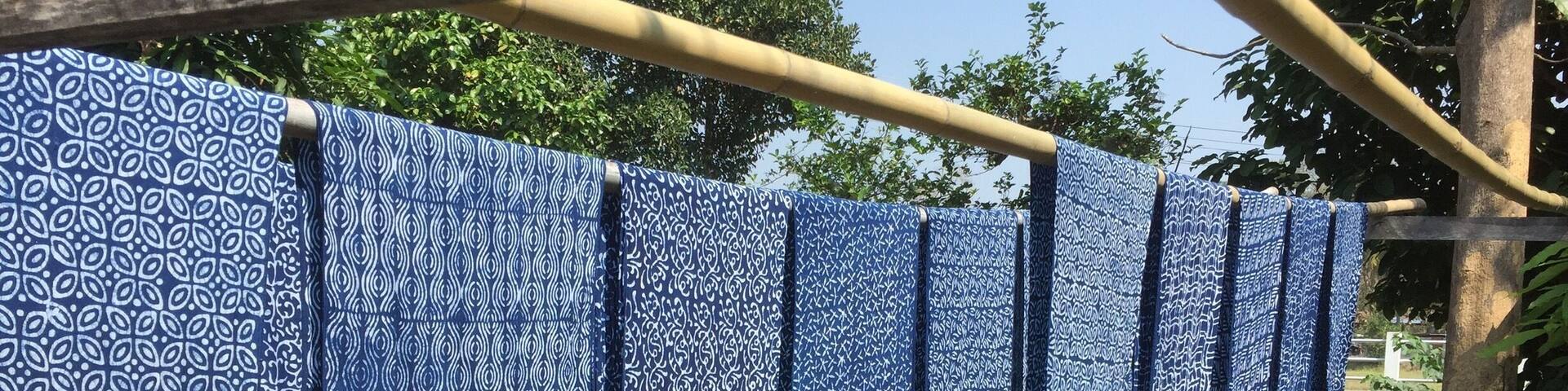 We visited a shop that still uses the process to make indigo. Then, they use beautiful batik designs and dye the fabric.