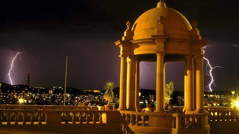 Pretoria which includes a city, night scenes and heritage architecture
