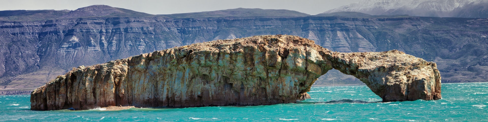 Rock formation "El Arco" at Lake Posadas, Argentina