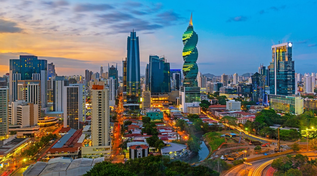 The colorful panoramic skyline of Panama City at sunset with high rise skyscrapers, Panama, Central America.
