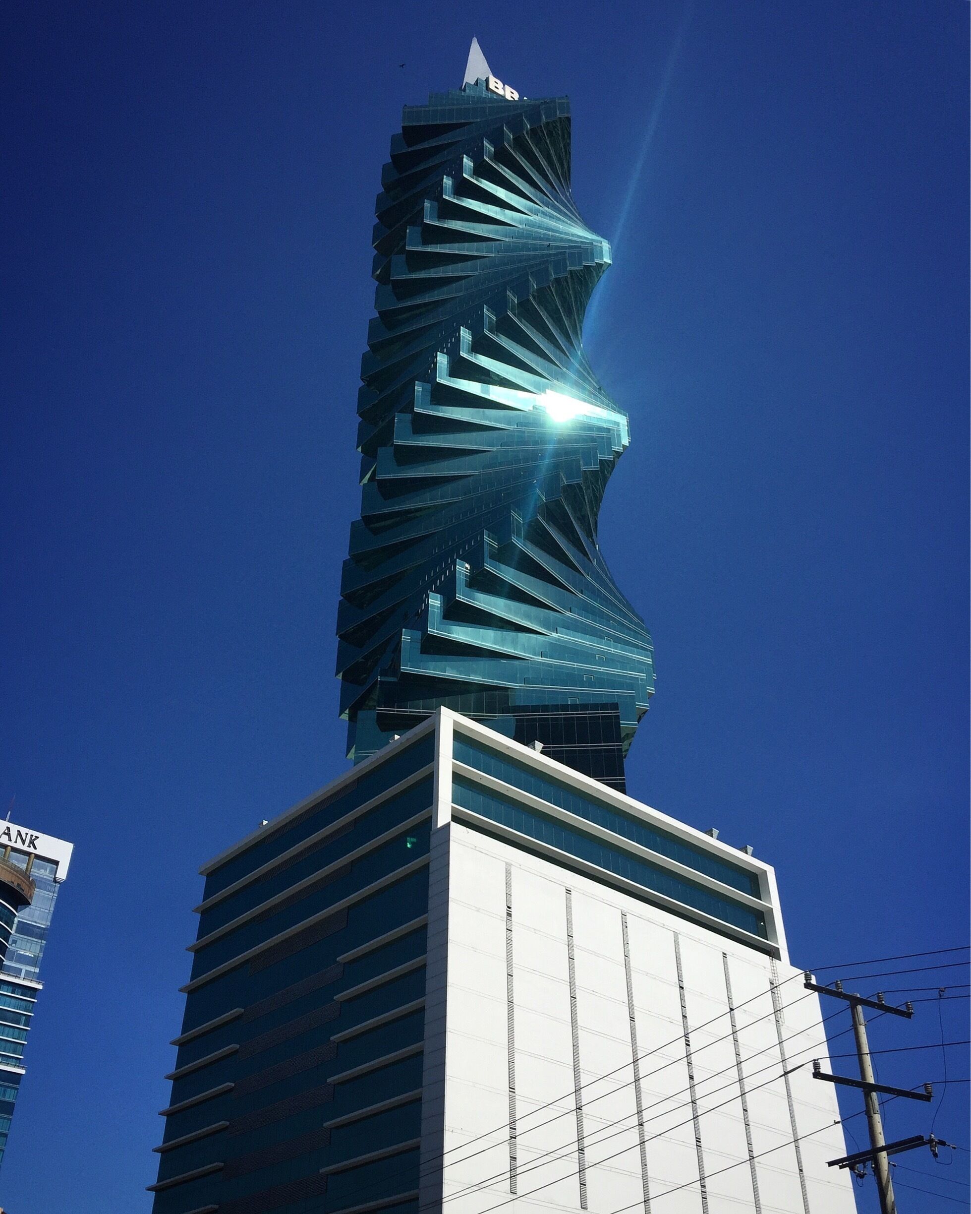 The F&F Tower 242,9m (previously known as the Revolution Tower) is an office tower in Panama City. Emporis selected the F&F Tower among the top 10 best skyscrapers of the year in 2011, ranking it 7th out of the 10 Emporis Skyscraper Award winners for its architectural excellence regarding the design of building and its functionality. It is also one of the most iconic buildings of Panama City. #tower #revolutiontower #spiral #spiraltower