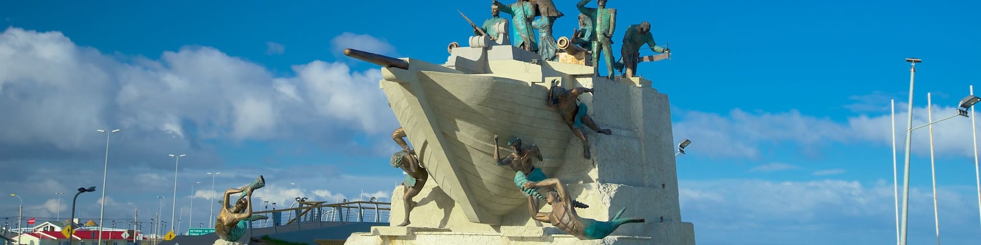 Punta Arenas which includes a statue or sculpture, outdoor art and general coastal views