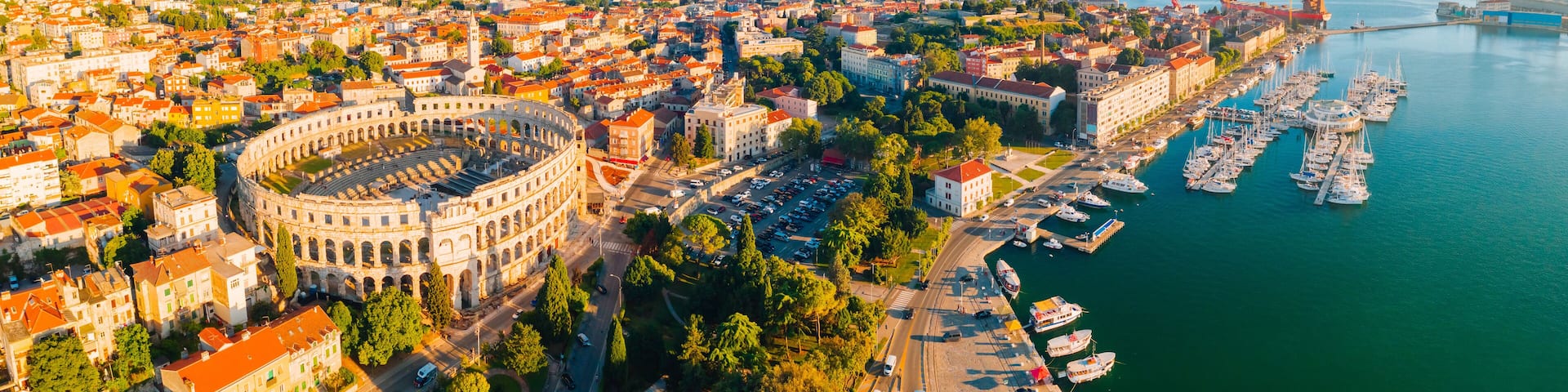 Aerial drone photo of famous european city of Pula and arena of roman time.