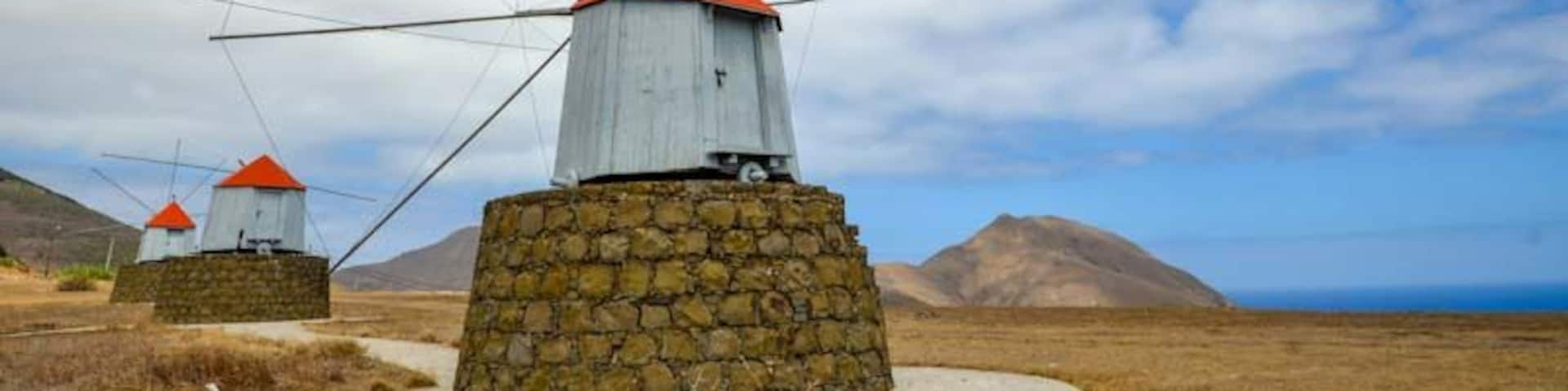 Three preserved windmills standing proud on Porto Santo Island.