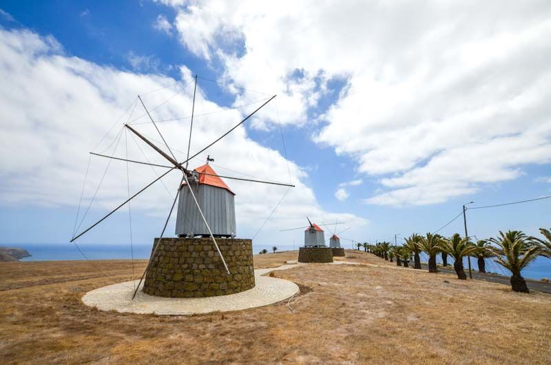 Three preserved windmills standing proud on Porto Santo Island.
