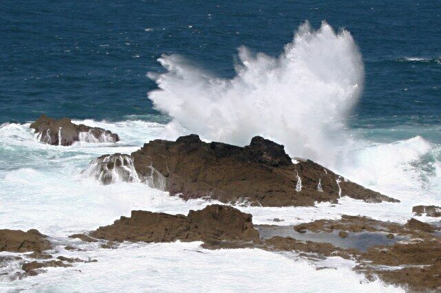 White Water on The Averack 2 Rocks verses the sea, in the end the sea will win, always.