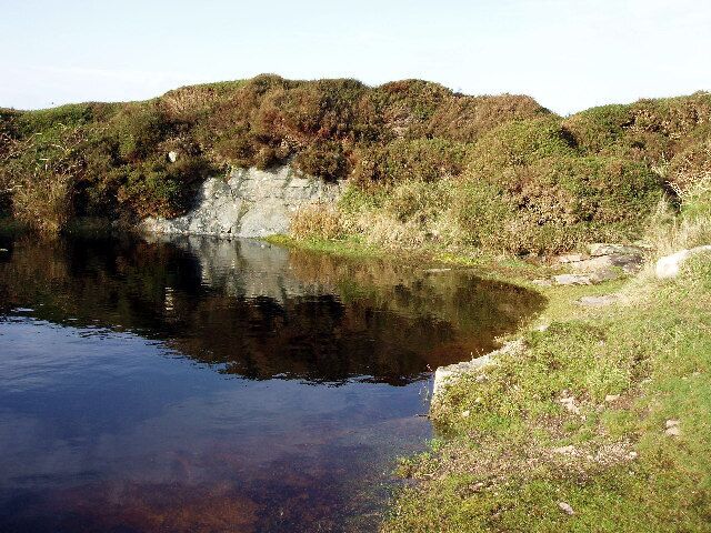 Quarry on Pendeen Carn. The Carn, rising behind the church, dominates the village of Pendeen. Called Carn Eanes on the OS map and locally Raw Carn, granite has been quarried here for local hedges and buildings.