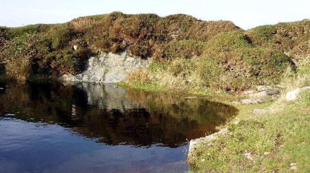 Quarry on Pendeen Carn. The Carn, rising behind the church, dominates the village of Pendeen. Called Carn Eanes on the OS map and locally Raw Carn, granite has been quarried here for local hedges and buildings.