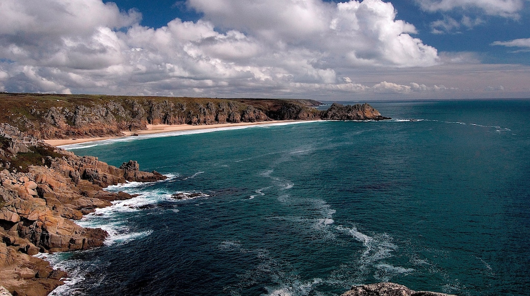 Looking across the stunning bay of Porthcurno to Treen cliff and the Logan rock promontory from Rospletha cliff.