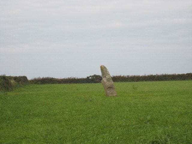 Trevorgans menhir A 2.45m high neolithic period standing stone in a field just NW of St Buryan village.