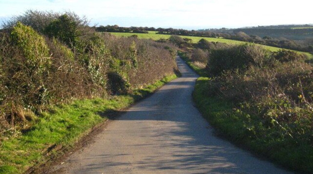 Minor road south of Carfury With a distant view of the sea in Mount's Bay.
